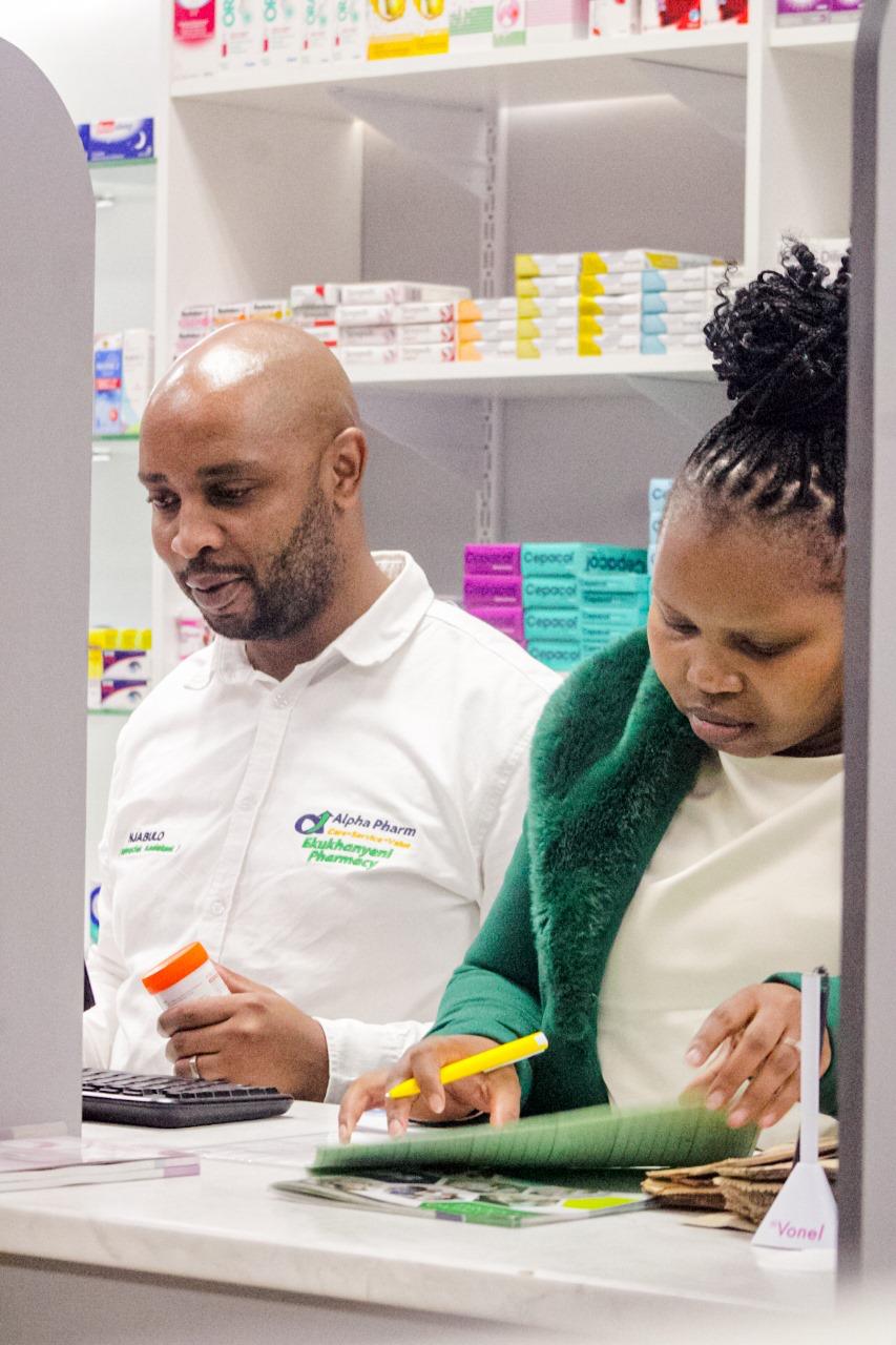 Divine Inspiration pharmacy team member supporting a customer